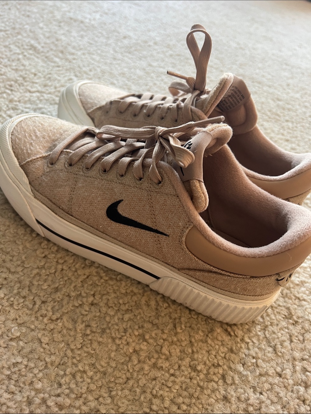 Nike Tan Low-Top Sneakers with Black Swoosh